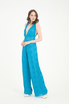 All eyes will be on you with this gorgeous limited edition v neck blue pleated jumpsuit! This is the jumpsuit that will reflect the spirit of Studio 54 completely. Imagine a jumpsuit shining with the disco lights of those times. Features: Pleated Jumpsuits For Women, One Piece V Neck Jumpsuit, Wedding Guest Jumpsuits , Dressy Jumpsuits, Plus Size , Deep V Neck Sleeveless Wide Leg Long Pants, 70s disco Jumpsuit For Women, Evening Jumpsuit, Formal Jumpsuit, Party Jumpsuit, Backless Jumpsuit,Disco Wedding Guest Dress Blue, Jumpsuit Formal, Jumpsuit Wedding Guest, Jumpsuit Backless, Dressy Jumpsuits, Jumpsuit Wedding, Evening Party Outfit, Disco Jumpsuit, Jumpsuit For Wedding Guest