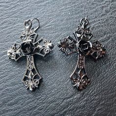 Gothic Black Rose Cross Earrings! Will Come New In Packaging When Shipped! Black And Dark Gray Cross Earrings With A Black Rose In The Middle! All Sales Are Final So Please Ask Any Questions You Have! Thank You! Black Cross Metal Earrings, Luxury Gothic Cross Jewelry, Black Gothic Cross Earrings, Goth Cross Earrings, Collectible Gothic Cross Jewelry, Cross Earrings, Black Rose, Earrings Color, In The Middle