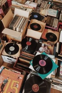 many records are stacked on top of each other