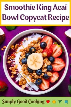 a bowl filled with fruit and cereal on top of a purple table