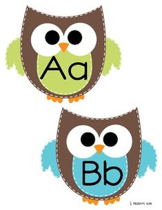 two owls are sitting on top of each other with the letter b in their beaks