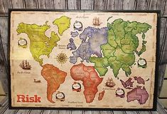 a framed map of the world with all countries and their names on it's sides