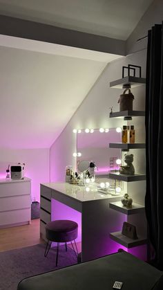 a bedroom with purple lighting and shelves on the wall, along with a bed in front of it