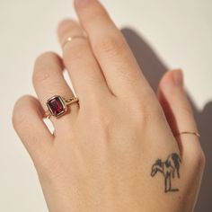 Gifts of Jupiter Garnet Ring | Catbird Fine Jewelry Ruby Ring With Gemstone Accents, Luxury Emerald-cut Ruby Ring, Garnet Gemstone Jewelry For Proposal, Lab-created Ruby Baguette Cut Gemstone Jewelry, Luxury 14k Gold Ruby Ring With Gemstone Accents, Luxury Birthstone Ring With Gemstone For Gift, Baguette Cut Lab-created Ruby Gemstone Jewelry, Baguette Cut Gemstone Jewelry For Proposal, Lab-created Ruby Jewelry With Rose Cut Diamonds For Promise