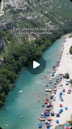 an aerial view of a beach with boats in the water and people swimming on it