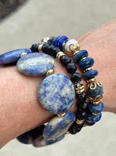 *7in. Genuine Blue Lapis Lazuli and Sodalite *18kt. gold filled beads *18kt. gold plated accent beads *Coin genuine Sodalite *Blue goodnight  * quality stretch cord for a comfortable fit *Made in 7in length.  Message our shop if you need a bigger size and we would be glad to do that for you. Sizing  Measure your wrist with a string and measure the string with a ruler or measuring tape.  Be sure to add an inch or two foe desired fit. Blue Stackable Jewelry With Round Beads, Blue Gemstone Stretch Bracelet As Gift, Blue Spiritual Stackable Beaded Bracelets, Blue Spiritual Stackable Jewelry, Healing Blue Stackable Bracelets, Crystal Bracelets Diy, Gems Bracelet, Blue Lapis Lazuli, Beads Bracelet Design