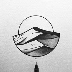 a pen and ink drawing of mountains in a circle