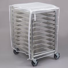 a plastic cart with many drawers on wheels