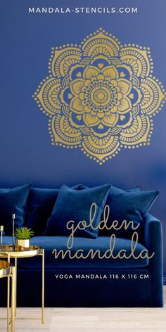 the golden mandala wall decal is shown in gold on a blue background