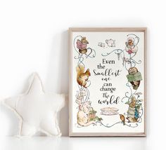 a white star is next to a framed print with an inspirational quote on the front