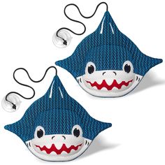 two blue shark face masks with white teeth and black nose wire attached to earphones