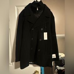 Calvin Klein Pea Coat Size Large Brand New Black Long Pea Coat With Pockets, Black Pea Coat With Pockets For Cold Weather, Black Long Coat With Button Closure, Black Pea Coat With Lapel Collar And Pockets, Black Pea Coat With Lapel Collar For Spring, Black Long Sleeve Outerwear For Business, Casual Black Long Wool Coat, Spring Black Wool Pea Coat, Black Wool Outerwear With Button Closure