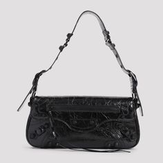 This black calf leather Le Cago Sling S bag from Balenciaga merges elegance with practicality. It includes a front flap with a zip pocket and an adjustable shoulder strap, allowing for a customized fit. Ideal for casual and modern occasions.

- Composition: 100% calf leather  
- Made in Italy  

- Dimensions: W:29cm  H:12cm D:4cm Signature Aesthetic, Balenciaga Black, Pure Black, Balenciaga Shoes, Leather Cap, Interior Wall, Black Mini, Lambskin Leather, Sling Bag