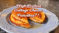 there is a cake that has been cut in half on a plate with the words high protein cottage cheese pancakes?