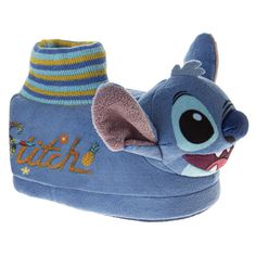 Calling all galactic adventurers! Get ready for out-of-this-world comfort with these adorable Stitch slippers. Made from super-soft nylex fabric, your little one's toes will be cushioned in interstellar plushness. The slip-on style makes for easy on and off, perfect for little space travelers who are always on the move. The real star of the show is the 3D Stitch design, featuring everyone's favorite mischievous experiment in all his fuzzy glory. With a padded footbed for added comfort, these sli Stitch Slippers, Unicorn Slippers, Real Star, Plastic Heels, Joe Boxer, Clog Slippers, Unicorn Plush, Closed Toe Shoes, Girls Shoes Kids