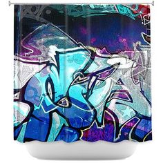 a shower curtain with blue and purple graffiti art on it's side, in front of a black background