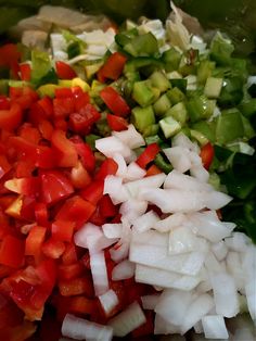 chopped up vegetables are in a large bowl