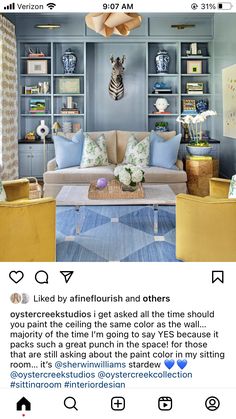 a living room filled with furniture and lots of bookshelves on top of it