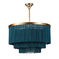 a blue chandelier with fringes hanging from the ceiling