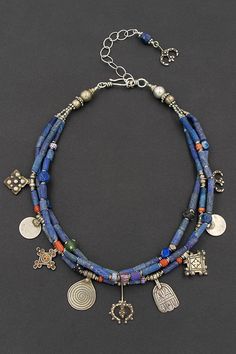 Lapis bead necklace with Berber silver amulet charms, old Moroccan coral, old African glass trade beads, and Afghan silver. One of a kind with a boho tribal vibe. Modern ethnic jewelry by Angela Lovett Designs Amulet Charm, Lapis Necklace, Lapis Lazuli Necklace, Amulet Necklace, Boho Necklace