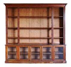 an old wooden bookcase with glass doors