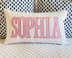 a pillow that has the word sophia on it