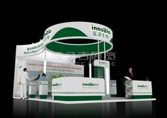 an exhibition stand with two men standing in front of it and the words innovabil on