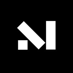 the letter k is made up of two white rectangles on a black background