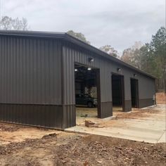 two garages are shown in the middle of construction