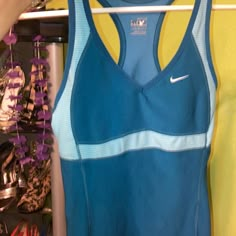 Vintage Nike Sports Tank Never Worn Excellent Vintage Condition Size Xs Fits Up To Small Only Bundle For Discounts Yes Pets Live Here Smokers Don’t Maybe This Isn’t Your Closet If Ur Allergic Vintage Workout Clothes, Blue Sporty Stretch Tank Top, Blue Stretch Sporty Tank Top, Blue Go-dry Tank Top For Sports, Blue Racerback Tank Top For Sportswear, Blue Racerback Tank Top Sportswear, Blue Athleisure Tank Top For Running, Blue Sporty Tops, 90s Blue Sports Top