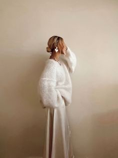 Elegant Knit Sweater With Soft Texture, Elegant Oversized White Sweater, Cozy Mohair Sweater In Winter White, White Mohair Sweater With Crew Neck, White Mohair Crew Neck Sweater, Cozy Winter White Mohair Sweater, Elegant Mohair Crew Neck Sweater, Oversized White Soft Sweater, White Long Sleeve Wedding Sweater