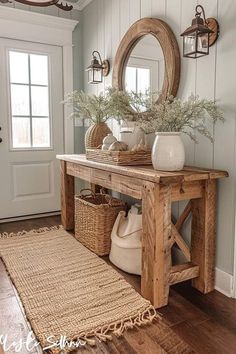 a wooden table sitting on top of a hard wood floor next to a white door