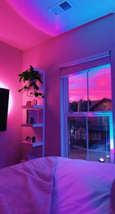 a bedroom with pink walls and purple lighting