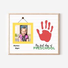 a child's handprint with the words my first day of preschool