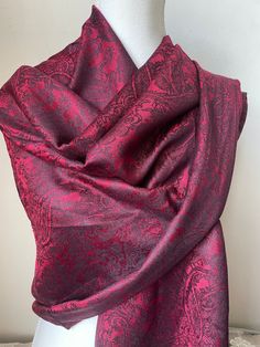 Introducing our luxurious silk pashmina scarf, the ultimate accessory to elevate any outfit. Made with a blend of premium silk and pashmina, this scarf is incredibly soft and lightweight, yet warm and cozy. Size : 180 cm * 72 cm Crafted by skilled artisans, this scarf features a beautiful woven pattern that adds a touch of elegance and sophistication to your look. The natural sheen of the silk and the plush texture of the pashmina create a stunning visual effect that is sure to turn heads. This Luxury Formal Pashmina Shawl, Luxury Pashmina Shawl For Formal Occasions, Formal Elegant Pashmina Shawl, Luxury Silk Shawl Scarves, Classic Red Silk Scarves, Elegant Winter Pashmina Shawl For Formal Occasions, Elegant Silk Shawl For Winter, Elegant Red Pashmina Scarf, Elegant Winter Formal Pashmina Shawl