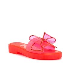 Jessica Simpson-Kesedan Sandal Enjoy a style that is a blast from the past! The Kesedan sandal from Jessica Simpson radiates early 2000s vibes thanks to the playful jelly material. Featuring a slide silhouette, rhinestone details, and a block heel, this bold pair adds a playful pop to any look. Summer Slip-on Slides With Translucent Outsole, Summer Party Slip-on Slides, Party Jelly Sandals With Round Toe In Plastic, Party Jelly Sandals With Round Toe, Summer Slide Sandals Made Of Plastic, Jelly Round Toe Sandals For Party, Open Toe Plastic Jelly Sandals For Party, Plastic Open Toe Jelly Sandals For Party, Plastic Open Toe Sandals For Party