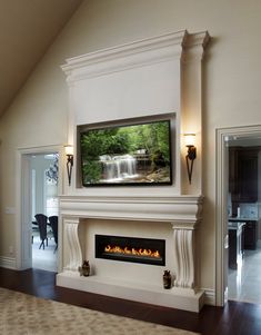 a large flat screen tv mounted to the side of a fireplace