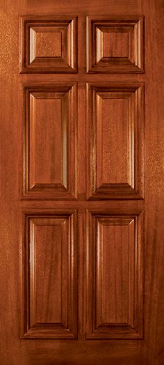 a close up view of a wooden door with four square panes on the front