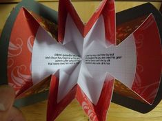 an origami flower with a poem written on it