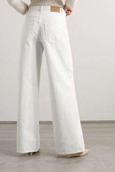 Find ISABEL MARANT ÉTOILE Lemony High-rise Wide-leg Jeans on Editorialist. The shape, style and overall vibe of denim can define an era, and there's no doubting the '70s feel of Isabel Marant's 'Lemony' pair. They have a high-rise waist and loose, wide legs. Style yours with a simple tank and sneakers or a blouse and platforms. Greece Cruise, High Rise White Jeans, Uzun Boy, High Rise Wide Leg Jeans, Flowing Dresses, Isabel Marant Etoile, Loose Jeans, Loose Outfit, Wide Legs