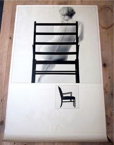 a black and white photo of a chair