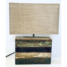 This pair of table lamps have been fashioned using weathered painted wood slats in neutral colors of teals, reds and browns. They have linen rectangular shades that fit into the tightest spaces and their neutral color palette makes these work in many decors. Perfect in a mid century modern, coastal, farmhouse, cabin, minimalist, Scandinavian or contemporary style. Thumb toggle switches. Wood Lamps, Wood Slats, Neutral Colour Palette, Neutral Colors, Painting On Wood, Lake House, Contemporary Style, Mid-century Modern, Table Lamp