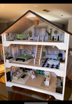 a doll house with all the furniture and accessories