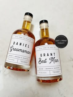 two bottles of grantman's best man syrup on a marble countertop with the label above them