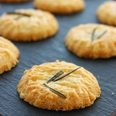 some biscuits are sitting on a baking sheet