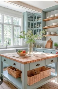 a large kitchen island with baskets on it