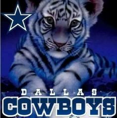 a white tiger sitting on top of a blue background with the words dallas cowboys written below it