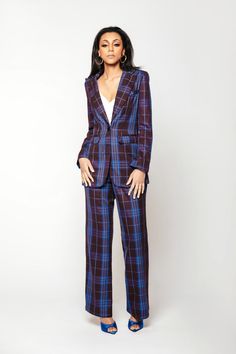 STYLE NOTES: The Sade pant is made from a soft and buttery 70s inspired plaid suiting. This high-rise pant is tailored with pressed pleats for a neat finish and falls to wide legs. A back elastic waist makes Sade a flattering choice. Pair with the matching blazer or an oversized sweater for a relaxed chick look 80% Polyester 20% Rayon Dry Clean Imported FIT NOTES: Model is 5'9" and wearing size X-Small High Waist Mid-weight, non-stretch fabric Fits true to size. Take your normal size Relaxed Fit Jackets Oversized, Blazer Suit Women, Polished Casual, Tapered Trousers, Peak Lapel, Tailored Blazer, 70s Inspired, Plaid Blazer, Oversized Blazer