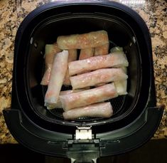 food is being cooked in an air fryer