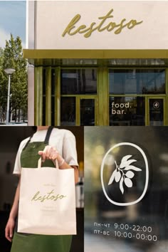 a woman carrying a bag in front of a restaurant